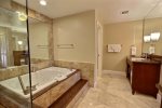 Master ensuite with spa tub and glassed shower
